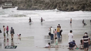 Извержение вулкана в Японии во время футбола. Пляж в Фукусиме открыли после цунами и аварии на АЭС