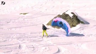 Экстремальный спуск на лыжах с парашютом