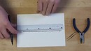 Простая подставка для телефона из скрепки