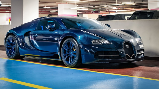 1of1 Mansory Empire Bugatti Veyron Blue Carbon driving in Dubai