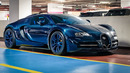 1of1 Mansory Empire Bugatti Veyron Blue Carbon driving in Dubai