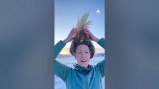 Woman Freezes Hair in Frozen Lake