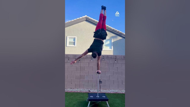 Man Performs Triple Handstand Switch
