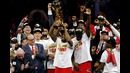 Kawhi Leonard is presented with the Bill Russell NBA Finals MVP trophy