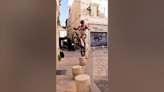 Guys Performs BMX Bike Stunt On Streets Using Bollards