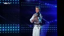 Юный скрипач на шоу талантов в Румынии