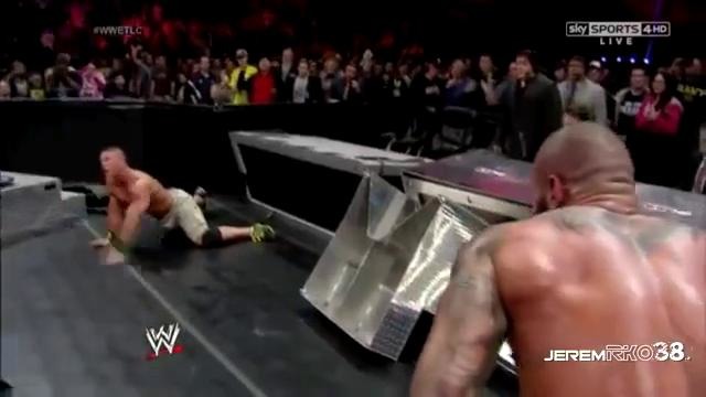 John Cena Attitude Adjustment Through Announce Table on Randy Orton