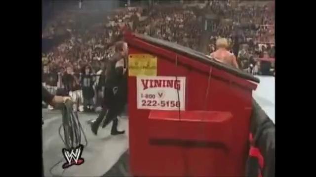 New Age Outlaws vs Cactus Jack and Chainsaw Charlie Dumpster Match