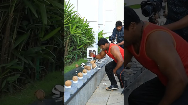 Most coconuts smashed with one hand in one minute – 122 by Abheesh P. Dominic