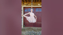Watch in awe as she dances effortlessly while hanging by her hair