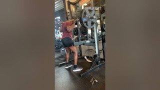 Weights From Barbell Fall Off as Guy Does Squats While Lifting it