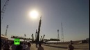 Установка ракеты с пилотируемым кораблём на стартовой площадке Байконура