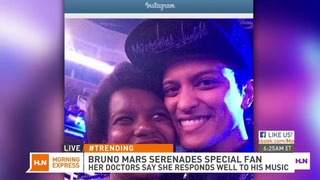 Bruno Mars serenades 11-year-old girl at concert