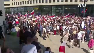 Сотни тысяч поляков прошли по Варшаве в 34-ю годовщину первых послевоенных свободных выборов