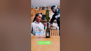 Dad Challenges Daughter to Pull out Note Between Bottles