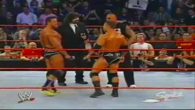 Rock ‘n’ Sock Connection-The Rock help Mick Foley