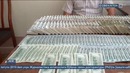 Buxorodagi bank xodimi noqonuniy valyuta savdosi ustida qo‘lga tushdi
