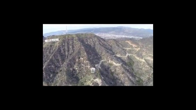 Тимати водружает российский флаг на холме Голливуд под песню «Калинка-малинка»