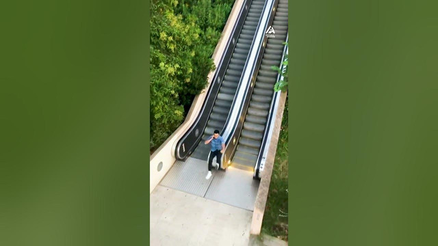 Guy Slides Down Escalator Railing | People Are Awesome