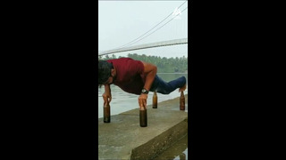 Warning: Don’t try these bottle pushups at home