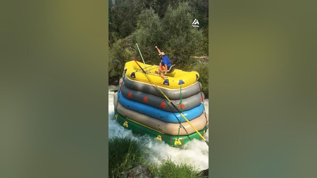Guy Rides Tower of Rafts Along Rapids | People Are Awesome