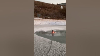 Guy Takes Dip in Frozen Lake