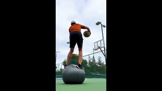 Man Shoots Basketballs While Standing On Yoga Ball | People Are Awesome #shorts