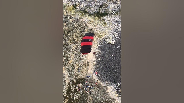 Person Does Base Jumping Off Cliff in Eastbourne, UK