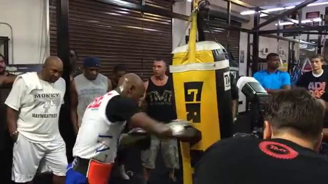 Floyd Mayweather Hitting the Heavy Bag While Training