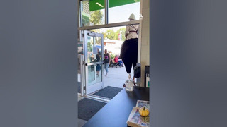 Guy Wearing Halloween Costume Rides Ostrich at Fair