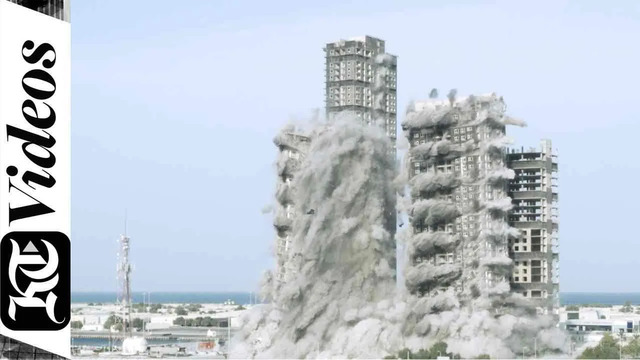 Четыре высотных здания в Абу-Даби взорвали за 10 секунд | Demolition of Mina Plaza tower in Abu Dhabi