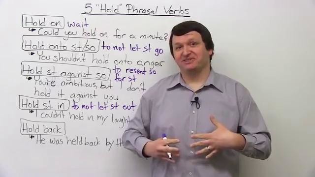 5 Phrasal Verbs with HOLD – hold on, hold against, hold in