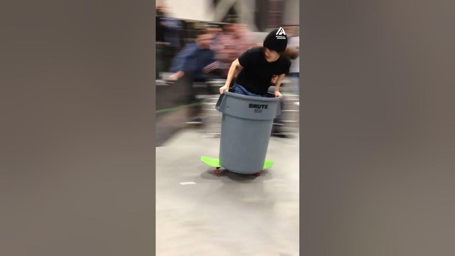 Guy Skates in Garbage Can over Kegs
