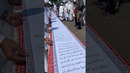 Longest handwritten Quran scroll – 1,106 metres by Jaseem Mohammed