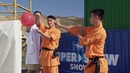 Шаолиньский монах броском иголки пробил стекло