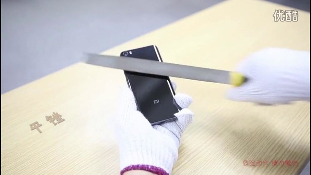 Xiaomi Mi5 с керамической крышкой испытали на прочность