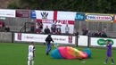 Parachutist lands on pitch during game – YouTube