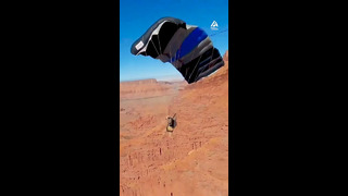 Man Jumps Off Cliff Then Glides Over Desert | People Are Awesome #shorts