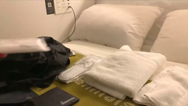 Капсульный отель в Японии с автоматическими откидными кроватями