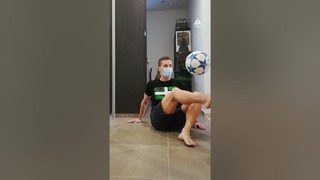 “Masked maestro on the floor, showcasing football magic