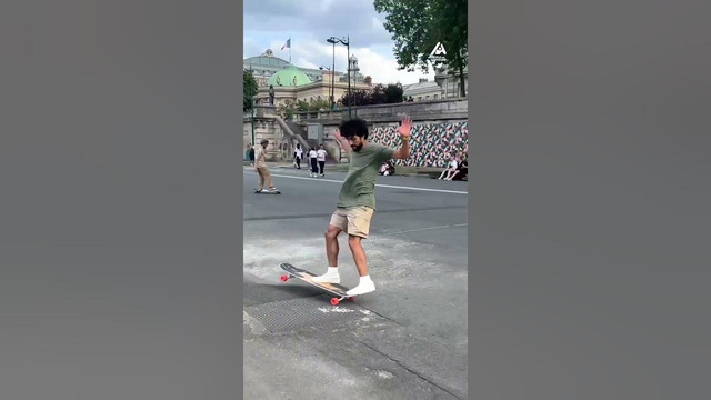 Guy Shows off Impressive Longboard Tricks
