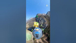 Wingsuit Flying Amidst Scenic Landscape | People Are Awesome #shorts