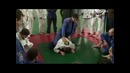 Выход из guard на спину противнику с удушением