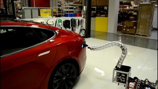 Tesla показала прототип роботизированной зарядки для электромобилей