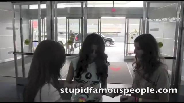 Selena Gomez Stops For Fans at JFK Airport in NY