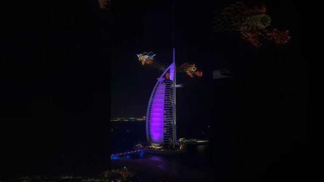 This drone display contains 1,497 drones flying around the Burj Al Arab