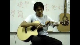 Китаец зажигает на гитаре