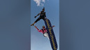 Most people angle diving (skydiving) simultaneously – 25 over the Pyramids of Giza