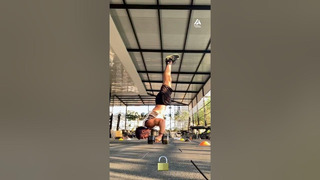 Guy Does Handstand Push-up While Balancing on Dumbbells