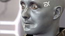 Кривляющихся гуманоидов и робособак показали на выставке World Robot в Пекине